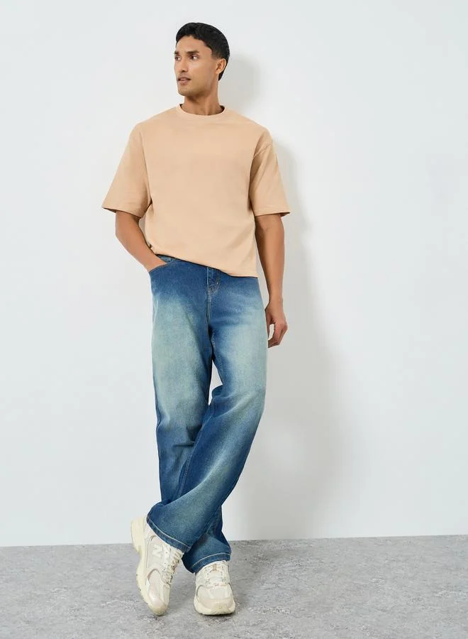 Styli  Men Blue Loose Fit Faded Jeans for Men | Best Price UAE